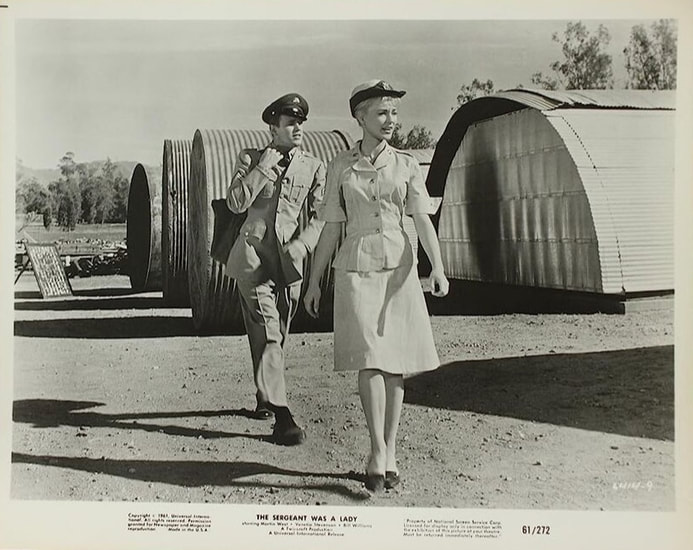 Black and white photo from the 1961 film, The Sergeant Was a Lady.