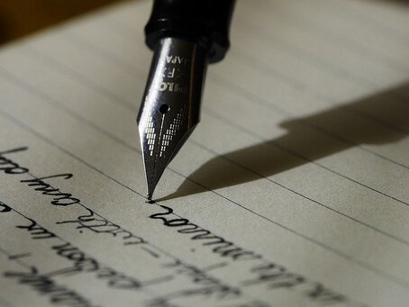 Ink Pen and Cursive Handwriting